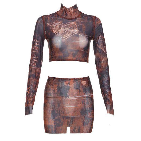 Ensemble mini-jupe courte en maille transparente à manches longues et col haut 