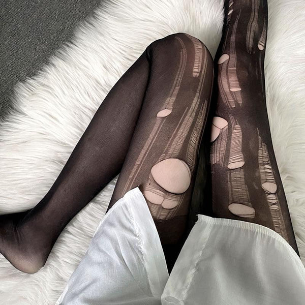 Collants en maille transparente déchirés à la main 