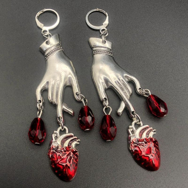 Boucles d'oreilles pendantes en métal à motif cœur