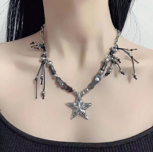 Collier de perles avec pendentif étoile
