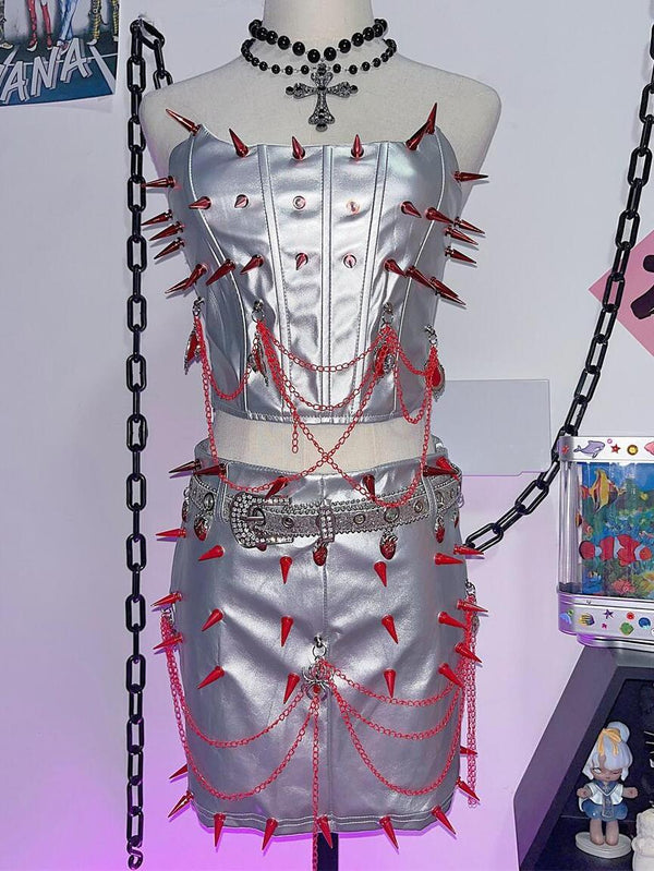 Ensemble mini-jupe tube à chaîne métallique avec appliques métalliques à rivets 