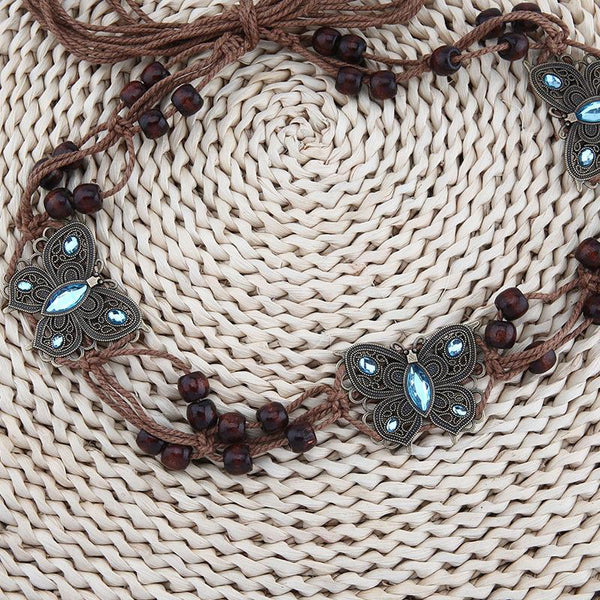 Chaîne de taille nouée en perles de strass papillon