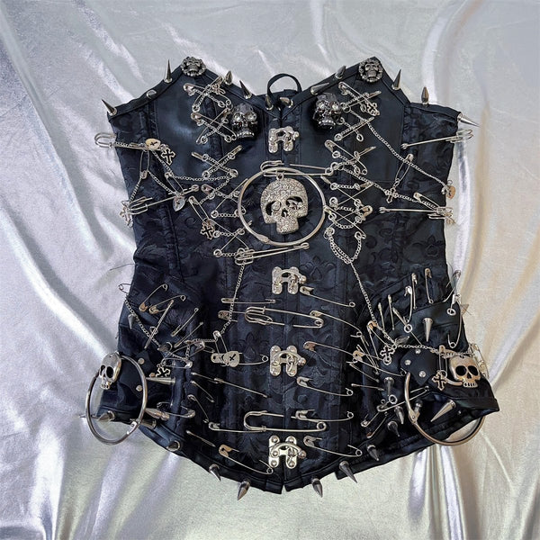Haut tube à lacets et rivets en cuir PU avec chaîne en métal et tête de mort 