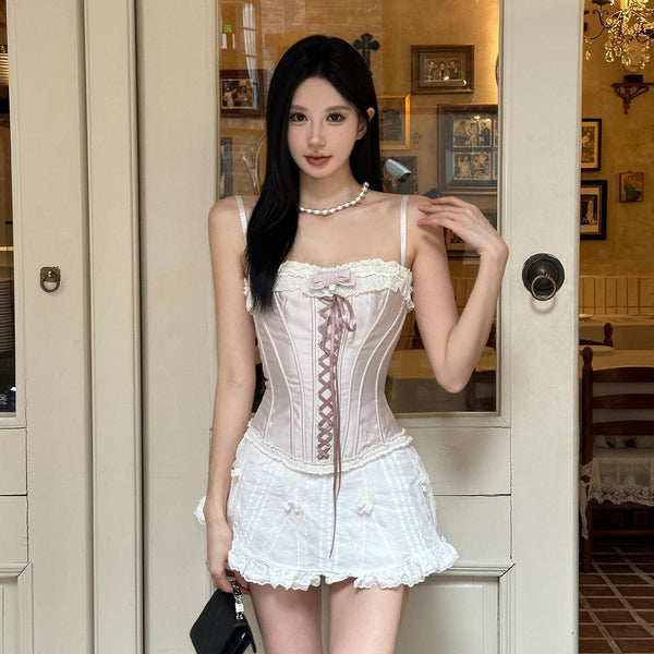 Haut bustier à lacets avec ourlet en dentelle et nœud papillon 