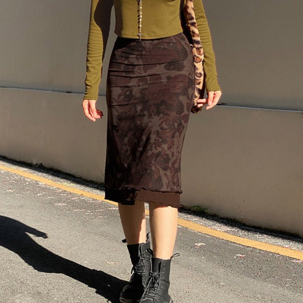 Jupe midi taille basse à volants contrastés et motif fleuri en maille 