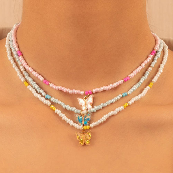 Collier pendentif papillon multicolore en perles 