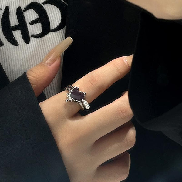 Bague ouverte en argent et perle de lave en forme de cœur 