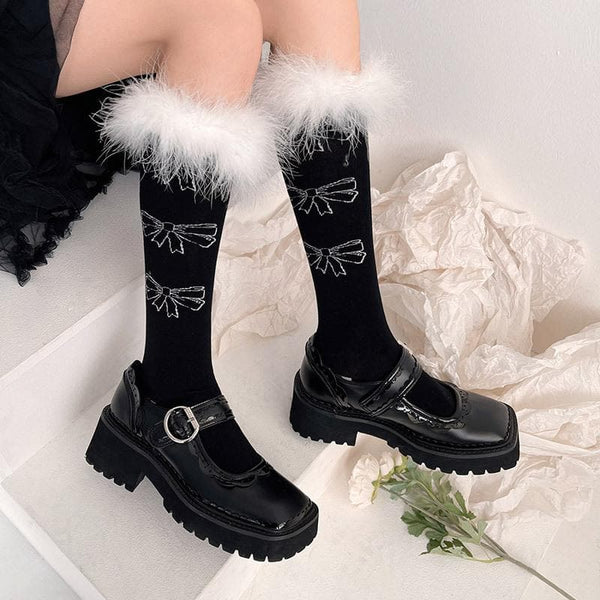 Chaussettes hautes à motif nœud papillon en dentelle et plumes 